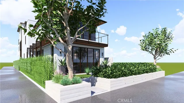 a view of a house with a tree and plants