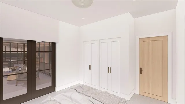 a view of entryway with wooden floor