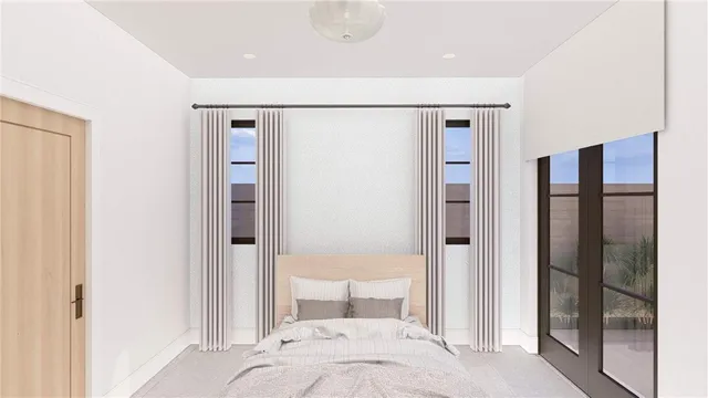 a bedroom with a bed and a glass door