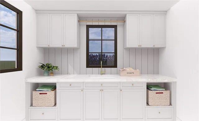 a room with cabinets and window