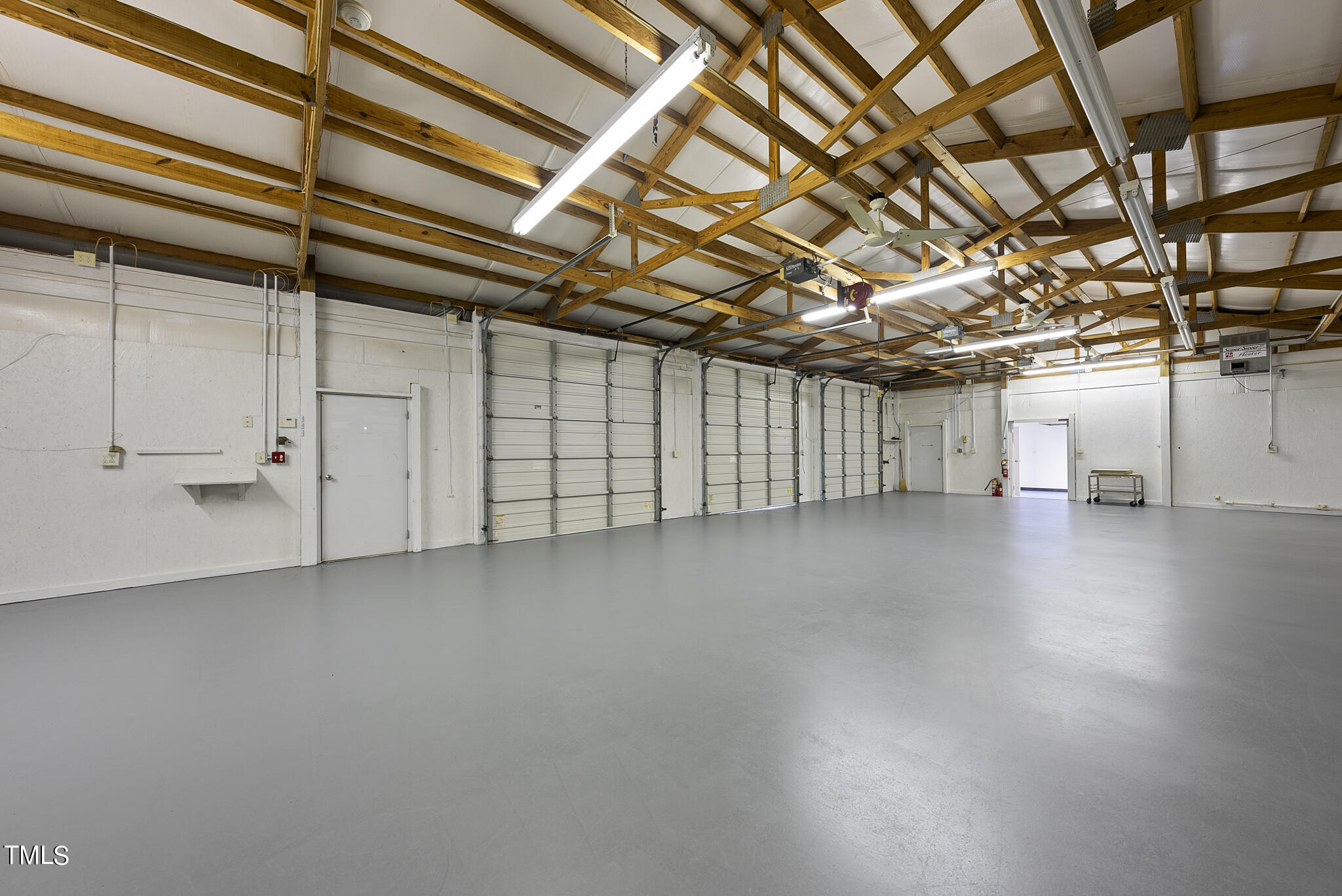 8480 Kennebec Road Willow Spring, NC 27592 - Photo 55 of 68 Expansive Garage Space