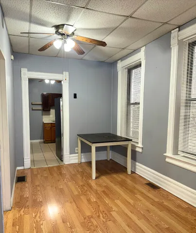a view of a livingroom with a furniture and a window
