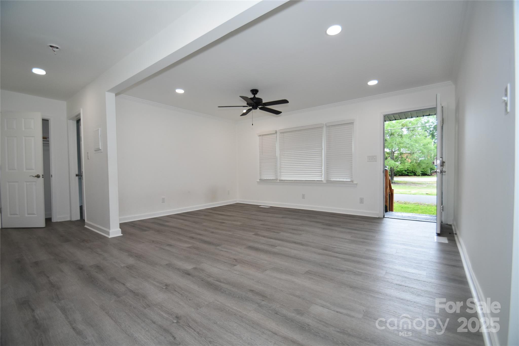 706 McIntyre Street Monroe, NC 28110 - Photo 11 of 20 a view of an empty room with a window