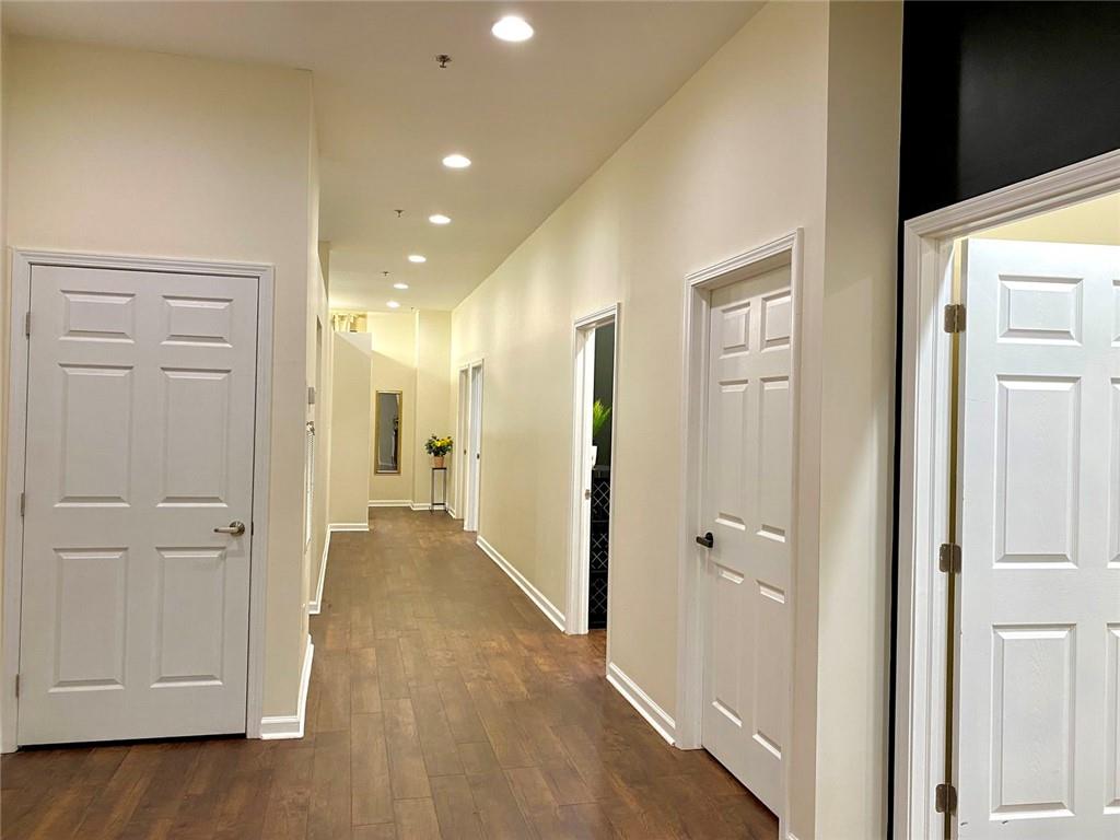 3636 Highlands Parkway Southeast, Unit 4 Smyrna, GA 30082 - Photo 14 of 32 a view of a hallway with wooden floor