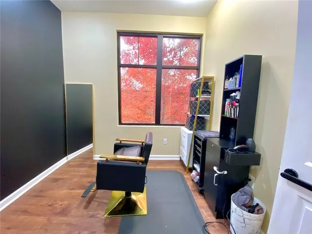 a room with furniture and a window