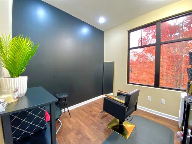 a room with furniture and a window