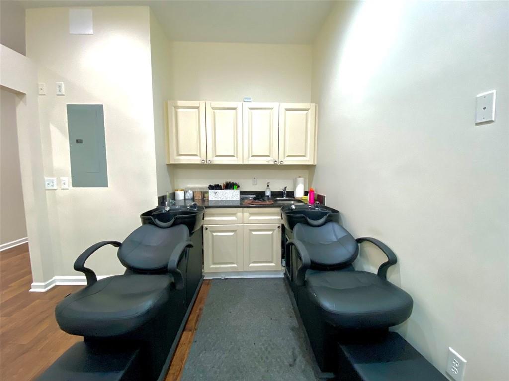 3636 Highlands Parkway Southeast, Unit 4 Smyrna, GA 30082 - Photo 22 of 32 a living room with furniture chess board and a window
