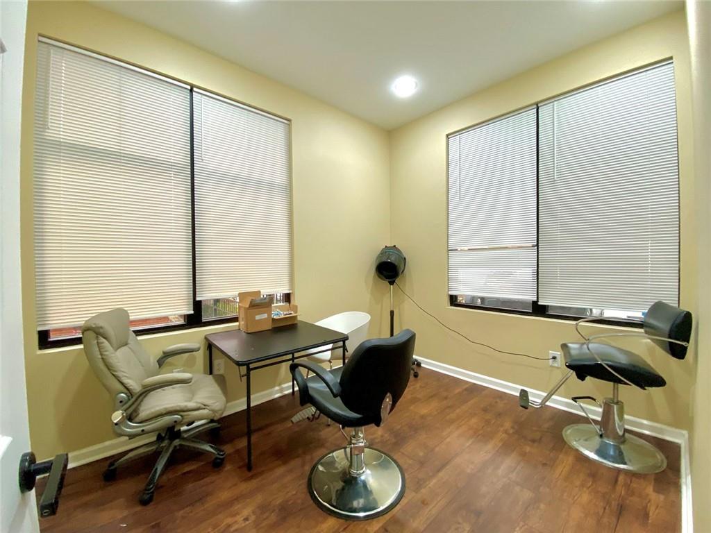 3636 Highlands Parkway Southeast, Unit 4 Smyrna, GA 30082 - Photo 25 of 32 a room with furniture and windows