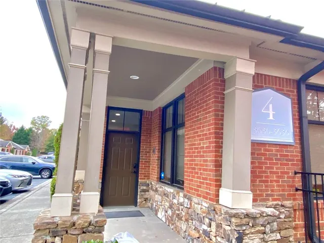 a view of a entryway door front of house