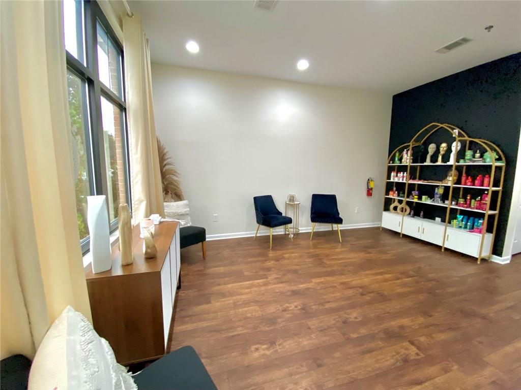 3636 Highlands Parkway Southeast, Unit 4 Smyrna, GA 30082 - Photo 7 of 32 a view of livingroom with furniture and window