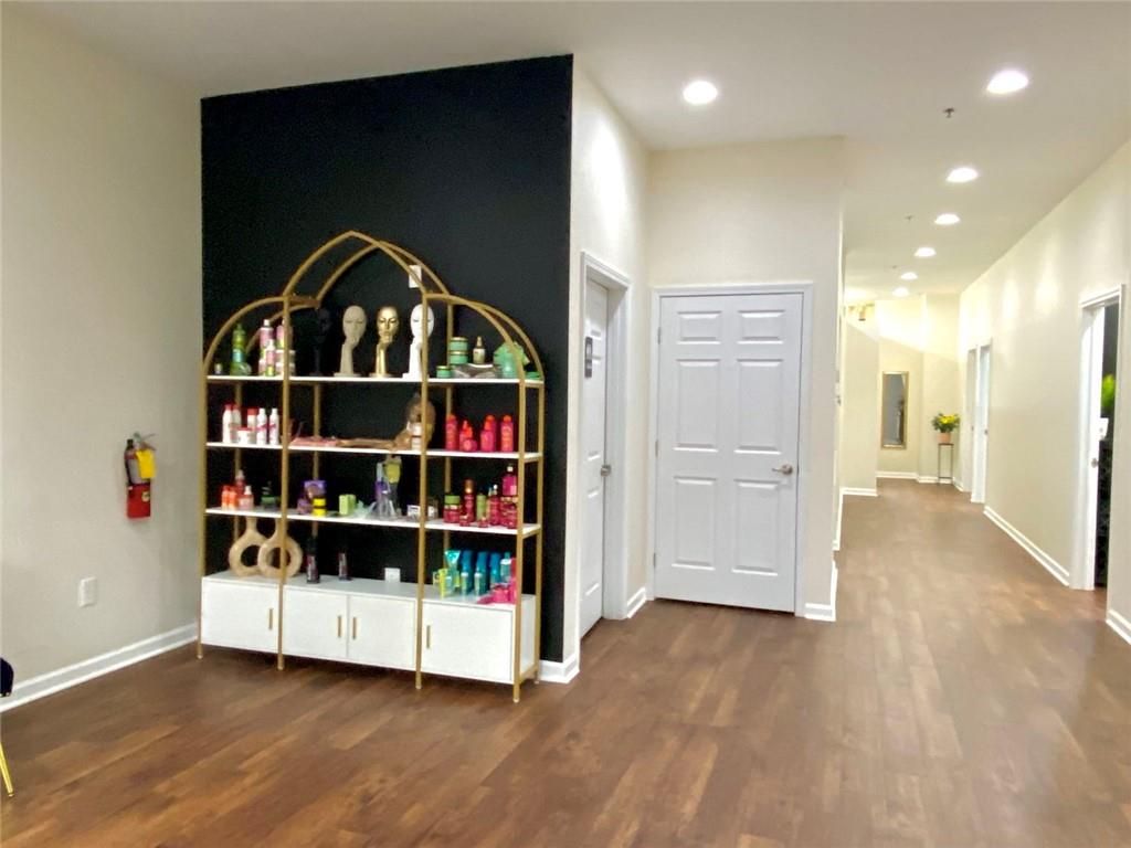 3636 Highlands Parkway Southeast, Unit 4 Smyrna, GA 30082 - Photo 10 of 32 a view of empty room with wooden floor and closet