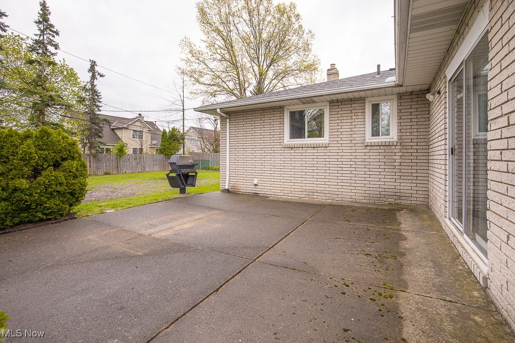 4569 McFarland Road Cleveland, OH 44121 - Photo 26 of 29 View of patio / terrace with a grill and fence