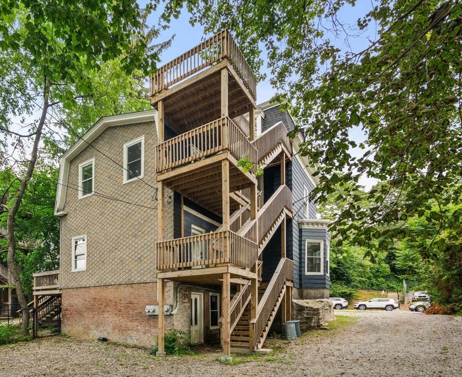35 Oak Avenue, Unit 2 Worcester, MA 01605 - Photo 18 of 22 a front view of a house with a yard
