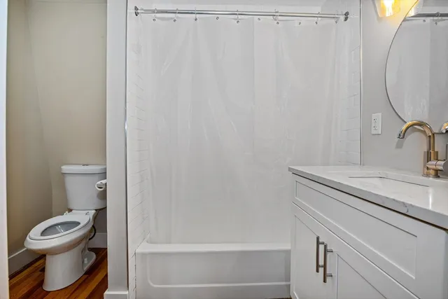 a bathroom with a toilet and a sink