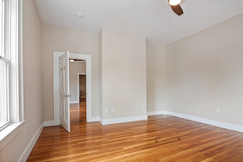 35 Oak Avenue, Unit 2 Worcester, MA 01605 - Photo 10 of 22 a view of empty room with wooden floor and fan