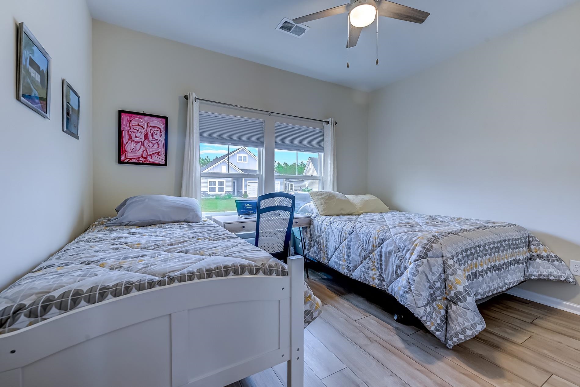 3016 Sistine Street Myrtle Beach, SC 29579 - Photo 11 of 39 Bedroom featuring wood finished floors and a ceiling fan