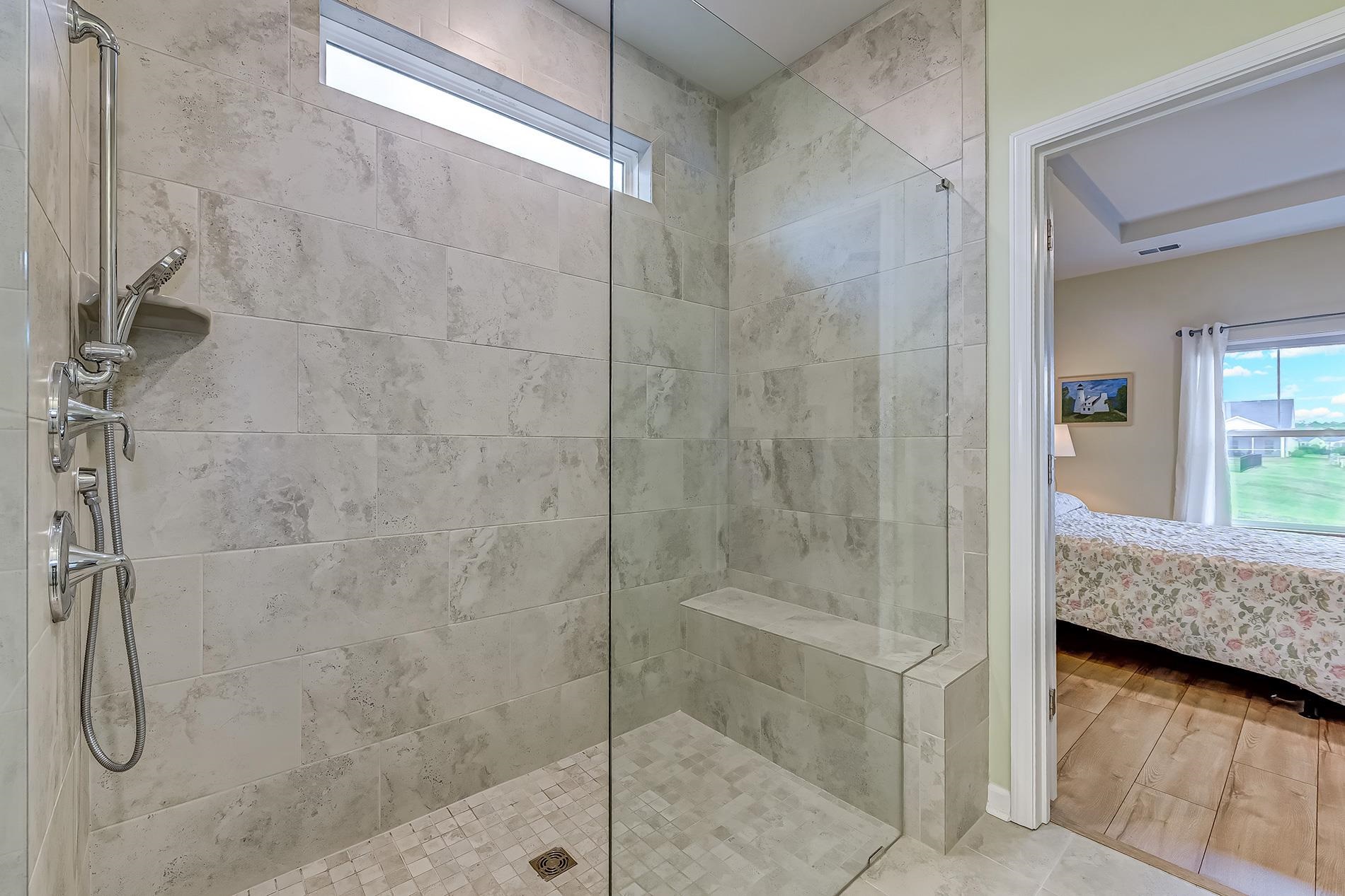 3016 Sistine Street Myrtle Beach, SC 29579 - Photo 18 of 39 Full bath featuring ensuite bath, a walk in shower, and wood finished floors