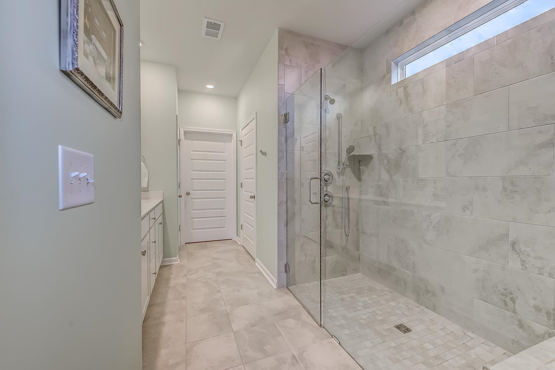 3016 Sistine Street Myrtle Beach, SC 29579 - Photo 19 of 39 Bathroom with vanity, a stall shower, and recessed lighting