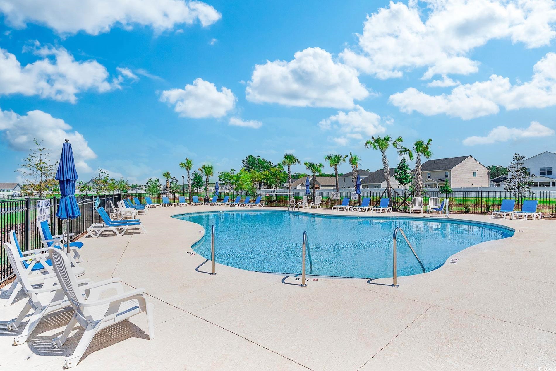 3016 Sistine Street Myrtle Beach, SC 29579 - Photo 38 of 39 Community pool featuring a patio and a residential view