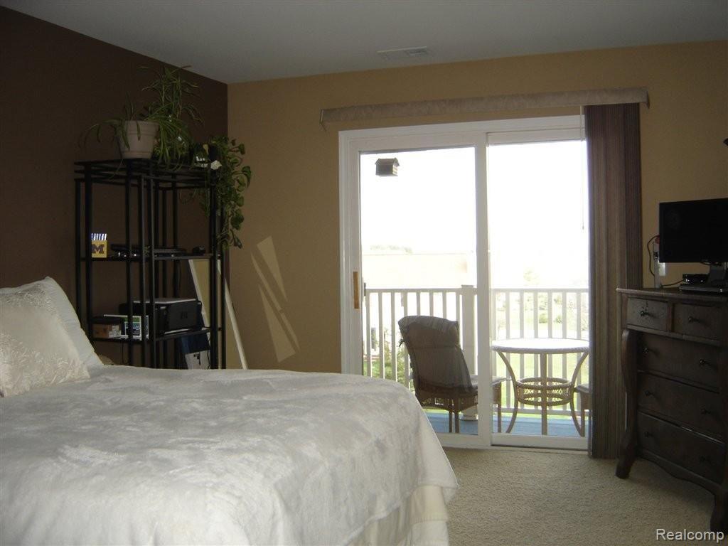 4093 Hampton Ridge Boulevard Howell, MI 48843 - Photo 10 of 14 Master with doorwall to balcony
