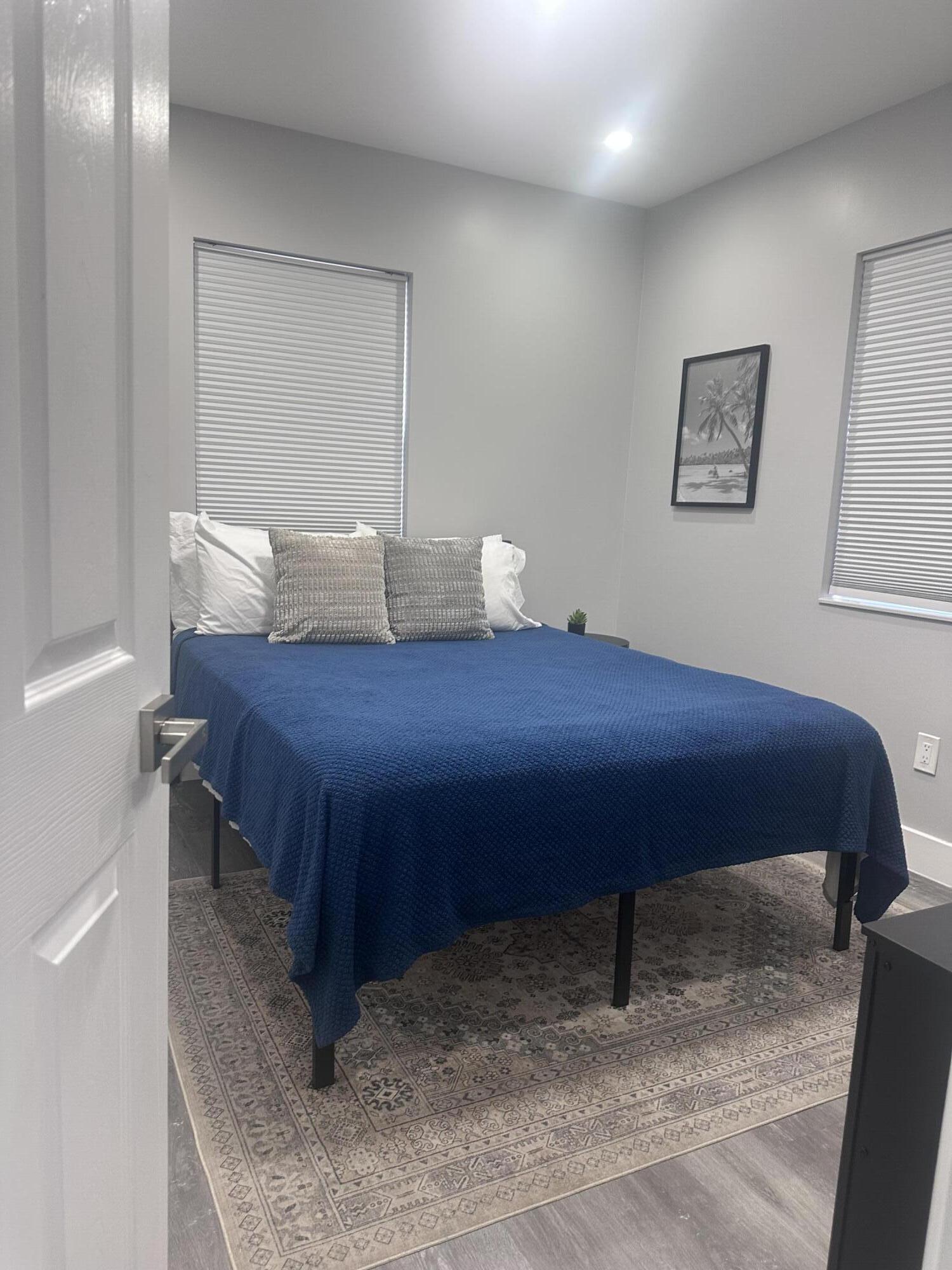 1016 State Street, Unit 12 West Palm Beach, FL 33407 - Photo 8 of 13 a view of bedroom with furniture