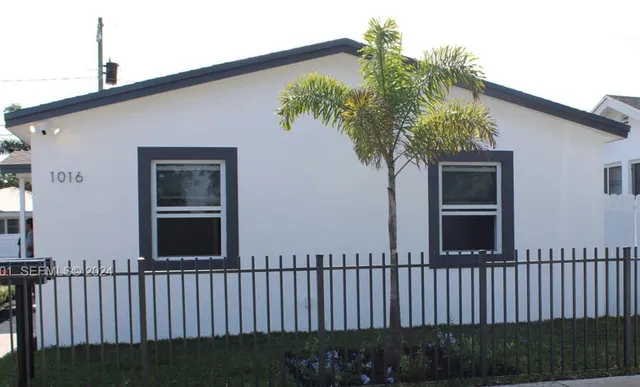 a porch with a seating space