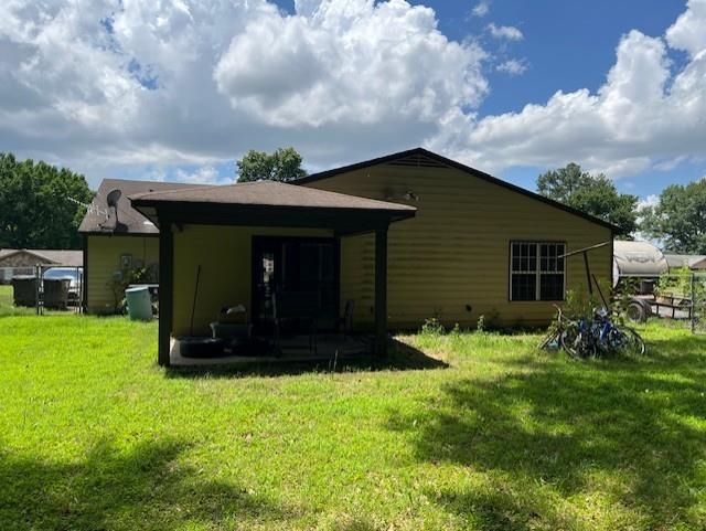 3784 McCain Road Memphis, TN 38109 - Photo 2 of 14 Exterior featuring a covered patio, siding facade, and a pitched roof
