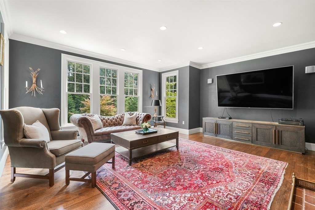 111 Lake Street Sherborn, MA 01770 - Photo 12 of 41 a living room with furniture and a flat screen tv