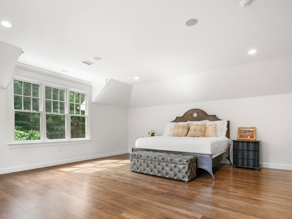 111 Lake Street Sherborn, MA 01770 - Photo 20 of 41 a room with a bed and a large window