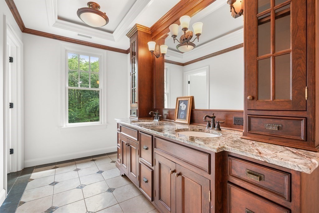 111 Lake Street Sherborn, MA 01770 - Photo 21 of 41 a bathroom with a sink a vanity and a mirror