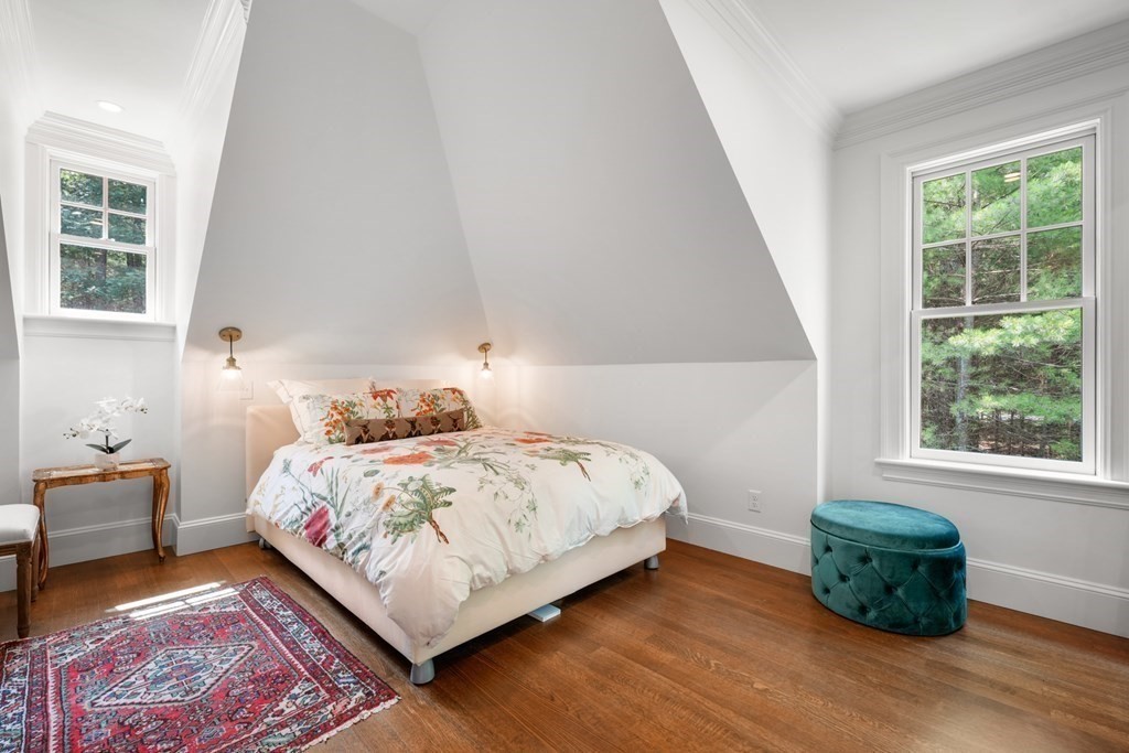 111 Lake Street Sherborn, MA 01770 - Photo 32 of 41 a bedroom with a bed and windows