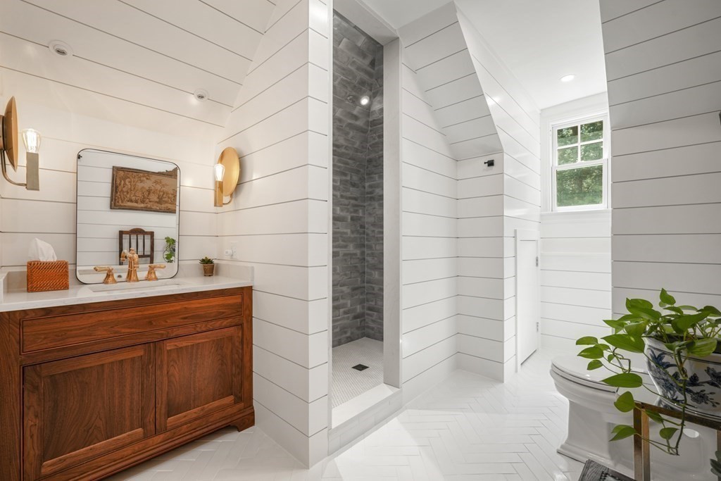 111 Lake Street Sherborn, MA 01770 - Photo 33 of 41 a bathroom with a sink and a mirror