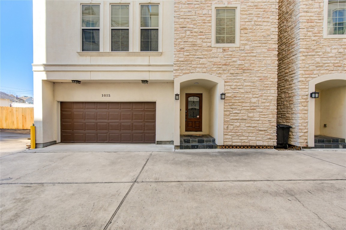 a front view of a house with a garage