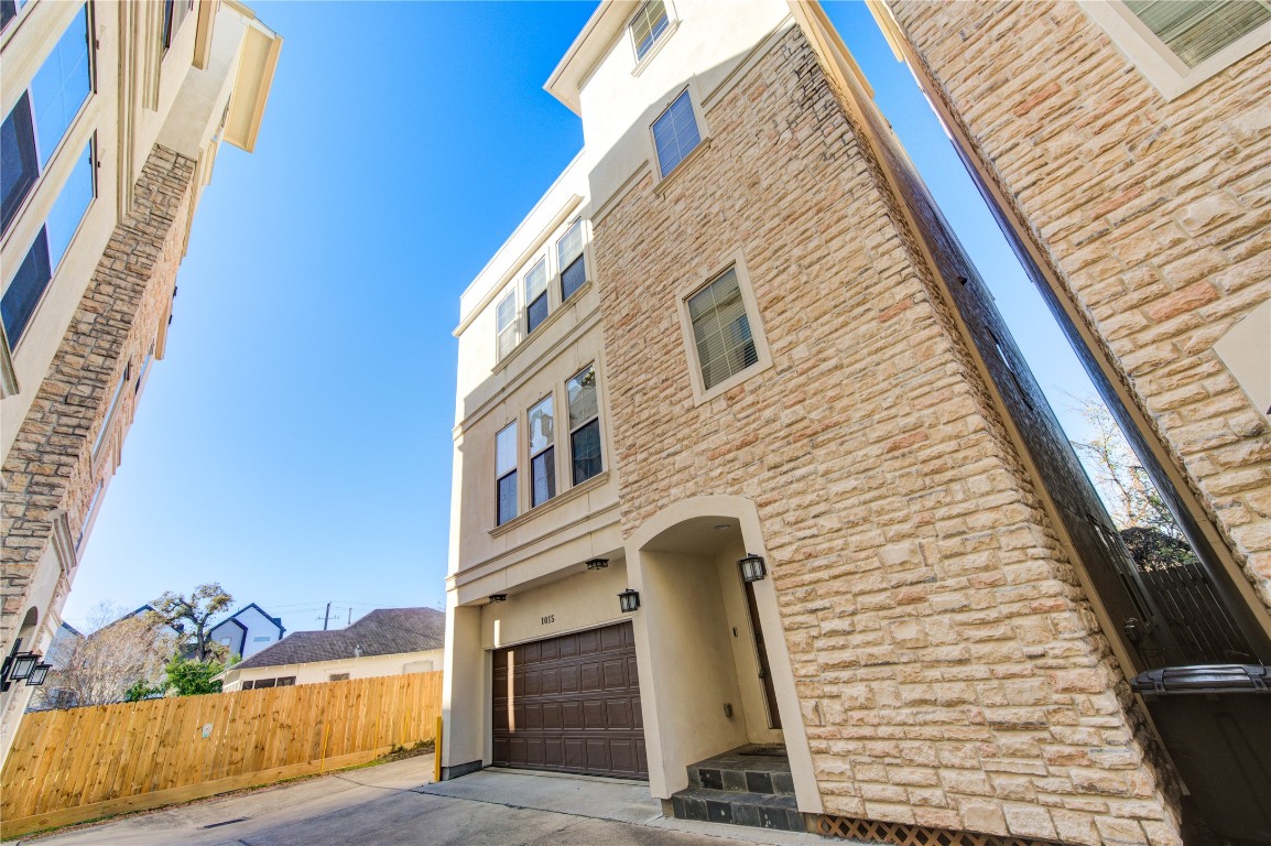 5226 Kiam Street, Unit 1015 Houston, TX 77007 - Photo 2 of 49 a view of a house with a door