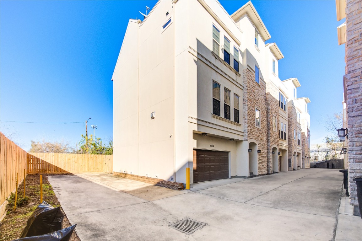 5226 Kiam Street, Unit 1015 Houston, TX 77007 - Photo 3 of 49 a view of a building along the street