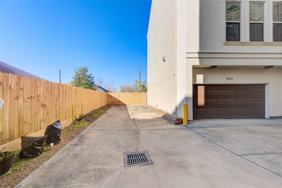 5226 Kiam Street, Unit 1015 Houston, TX 77007 - Photo 4 of 49 a view of a street with stairs