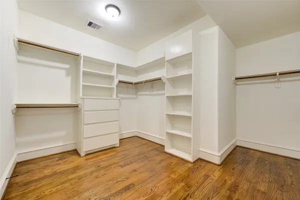 a view of an empty walk in closet