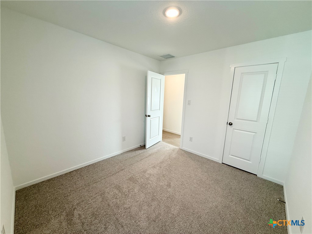 311 Moscato Road New Braunfels, TX 78130 - Photo 25 of 38 an empty room with an entryway