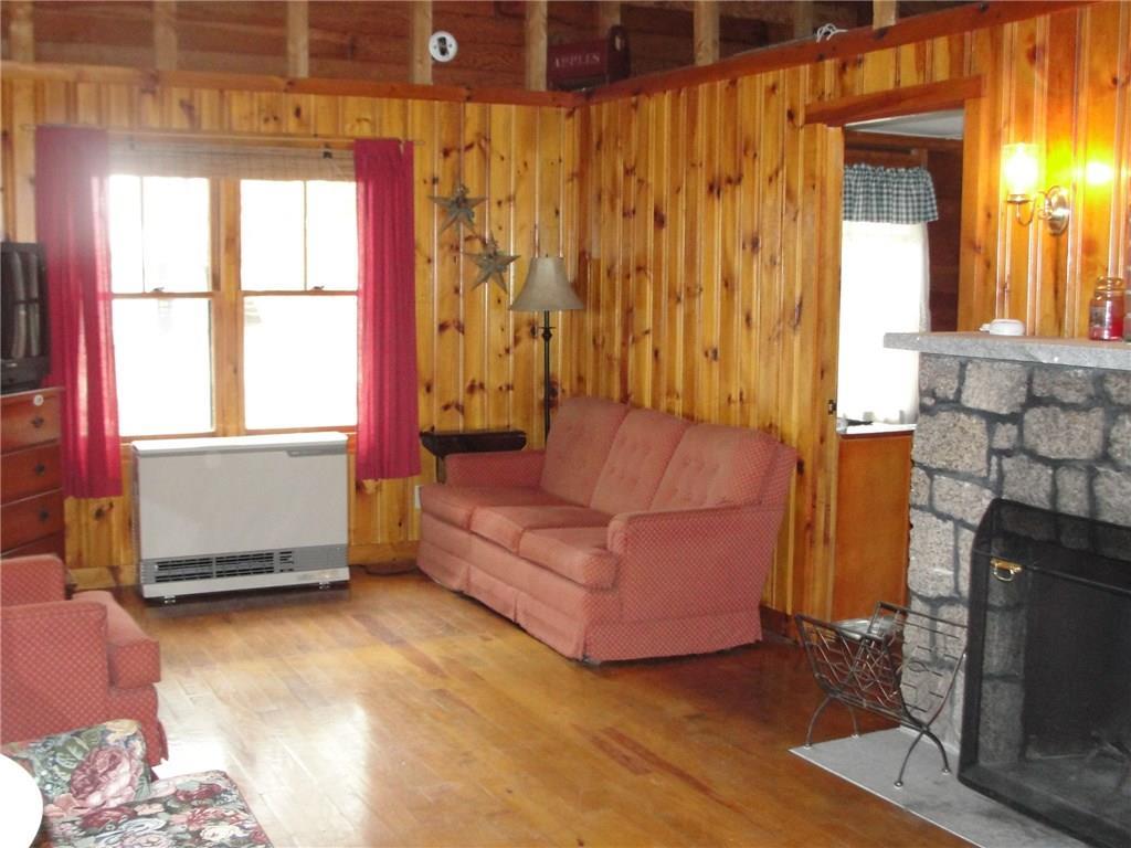 128 Highland Road Bridgton, ME 04009 - Photo 16 of 25 Living room has plenty of room, an...