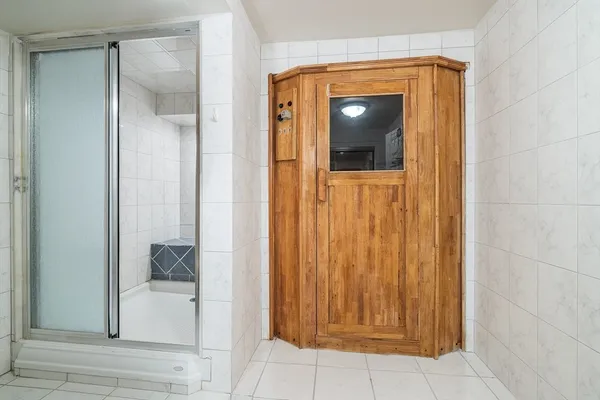 a view of a bathroom from a hallway