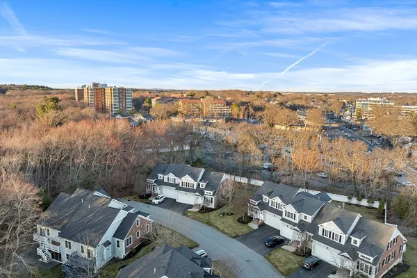 an aerial view of a house with a garden