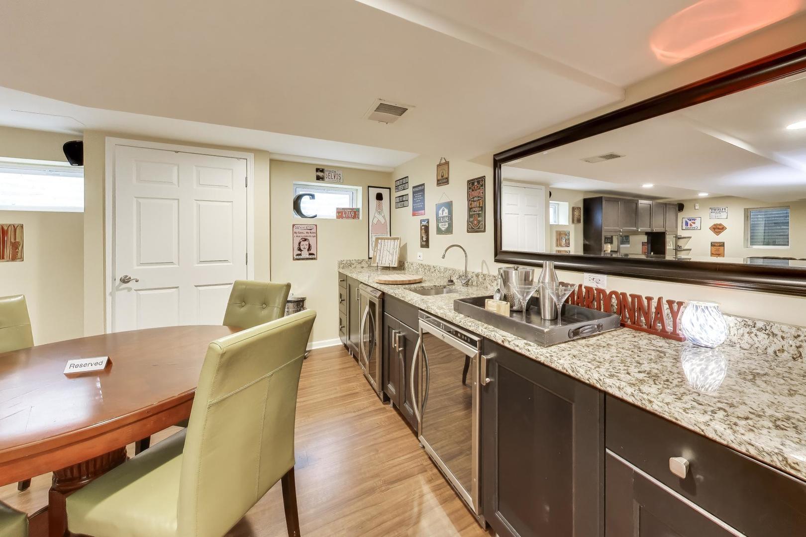 3956 Rutgers Lane Northbrook, IL 60062 - Photo 32 of 41 a large kitchen with granite countertop a sink and cabinets