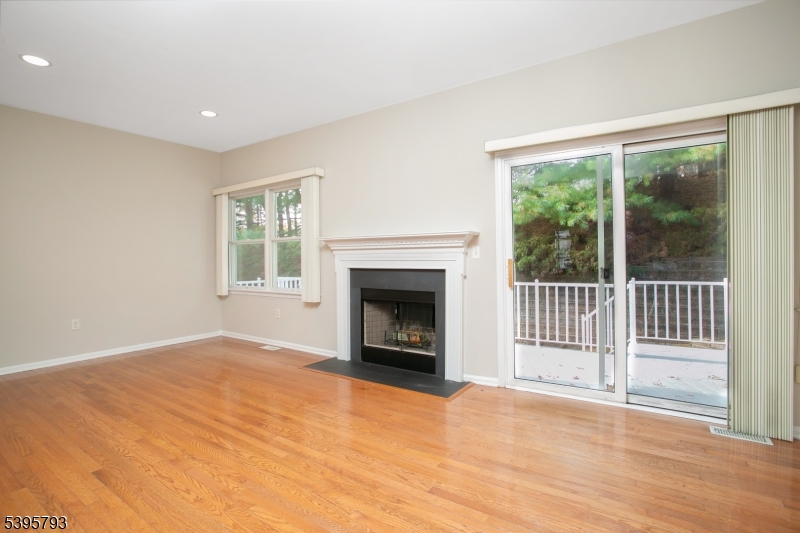 58 Autumn Ridge Road Morris Plains, NJ 07950 - Photo 11 of 30 a view of an empty room with a window and fireplace