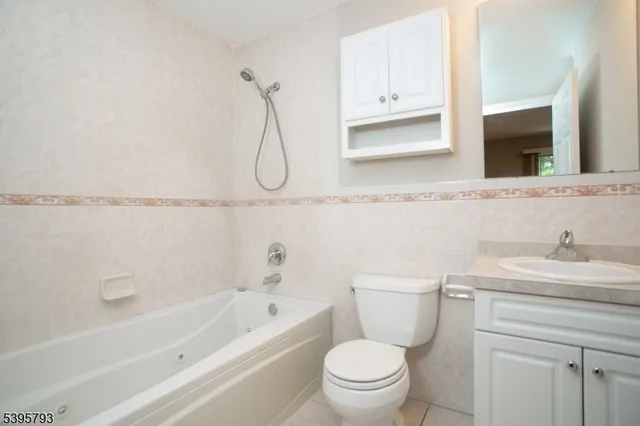 a bathroom with a sink a toilet and a bathtub