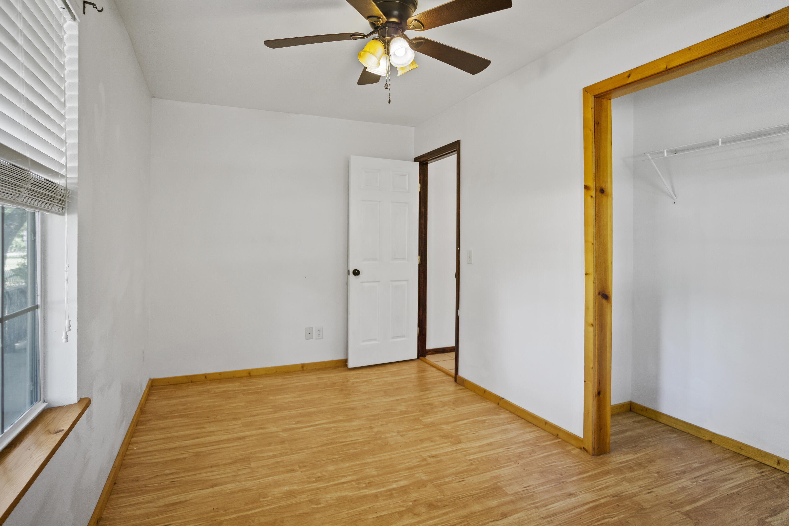 15766 Northeast Bob Sanders Road Hosford, FL 32334 - Photo 14 of 33 a view of empty room with wooden floor