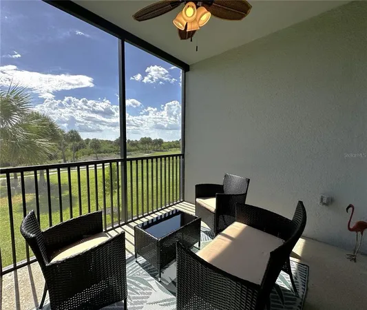 a front view of a house with garden and trees