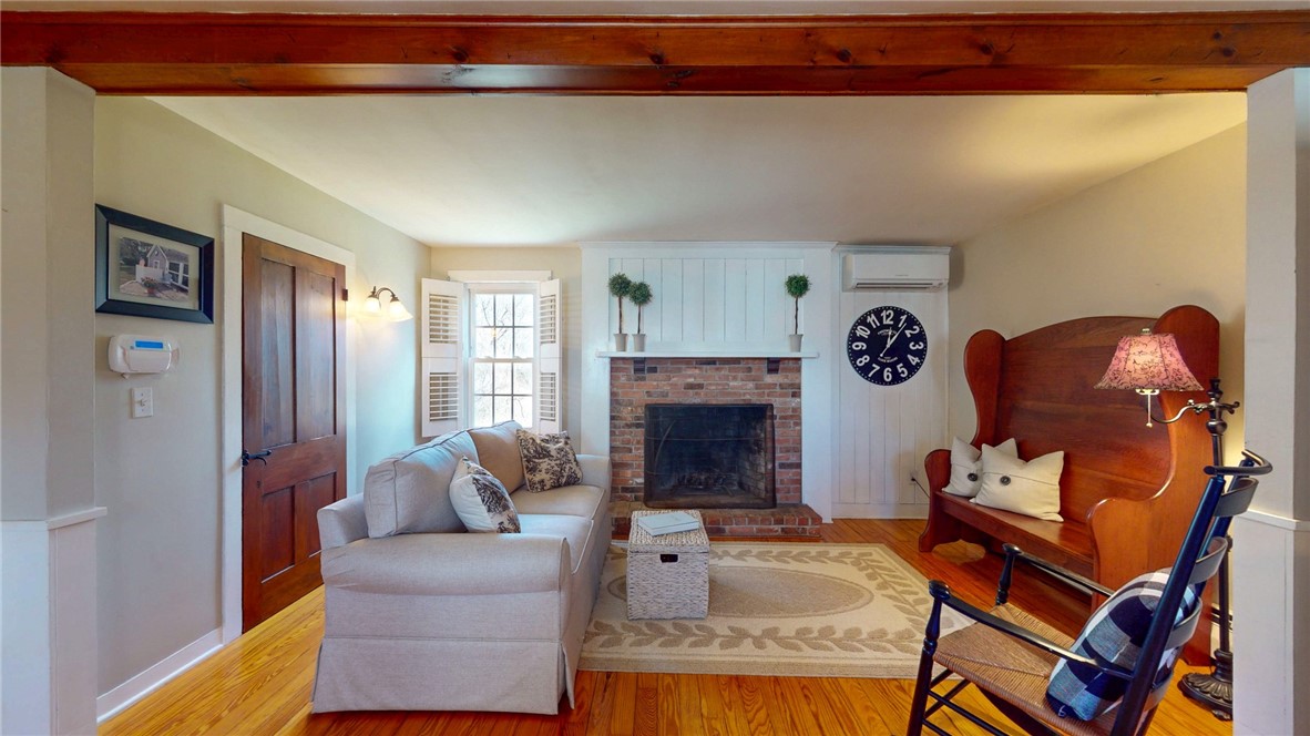 129 Canal Street Westerly, RI 02891 - Photo 5 of 42 Living room with fireplace