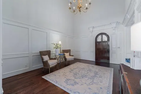 a view of a livingroom with furniture and wooden floor