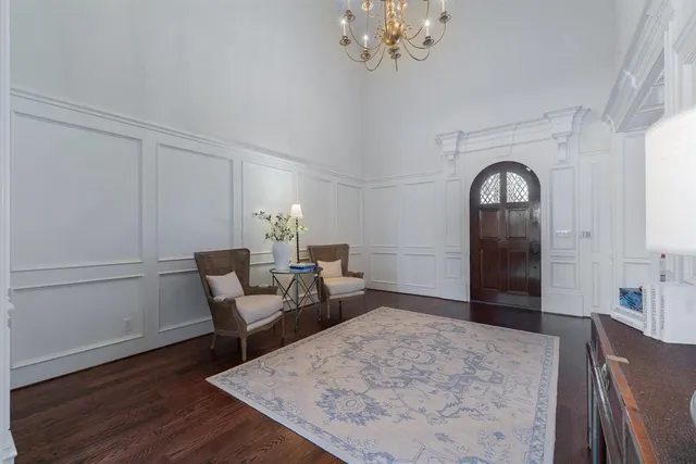a view of a livingroom with furniture and wooden floor