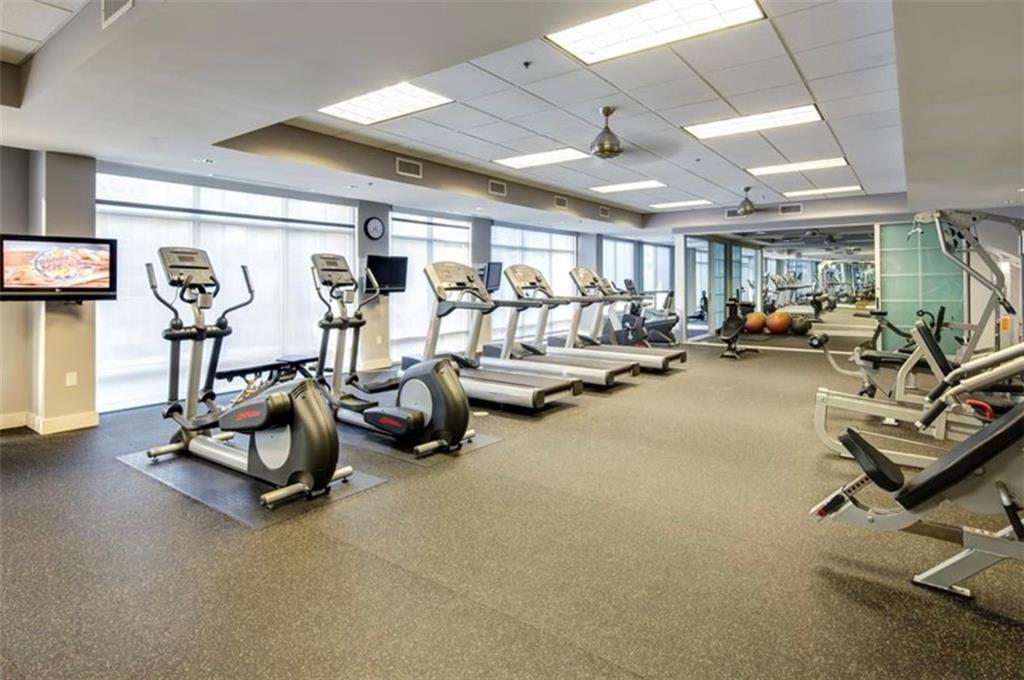 711 Cosmopolitan Drive Northeast, Unit 517 Atlanta, GA 30324 - Photo 28 of 29 a view of a room with gym equipment